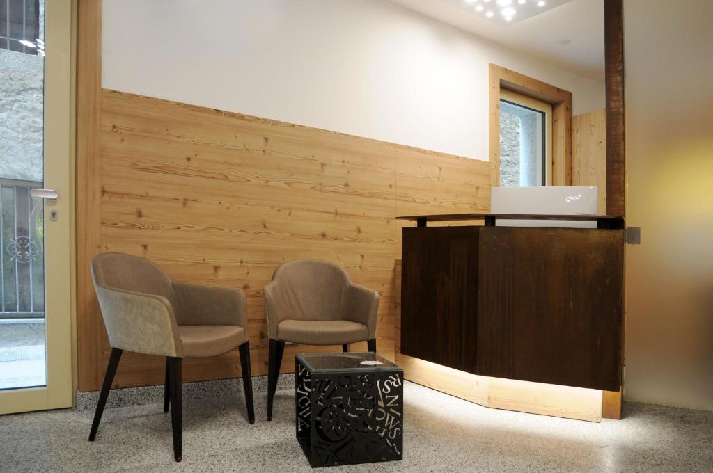 A seating area at TOURING HOTEL & SPA