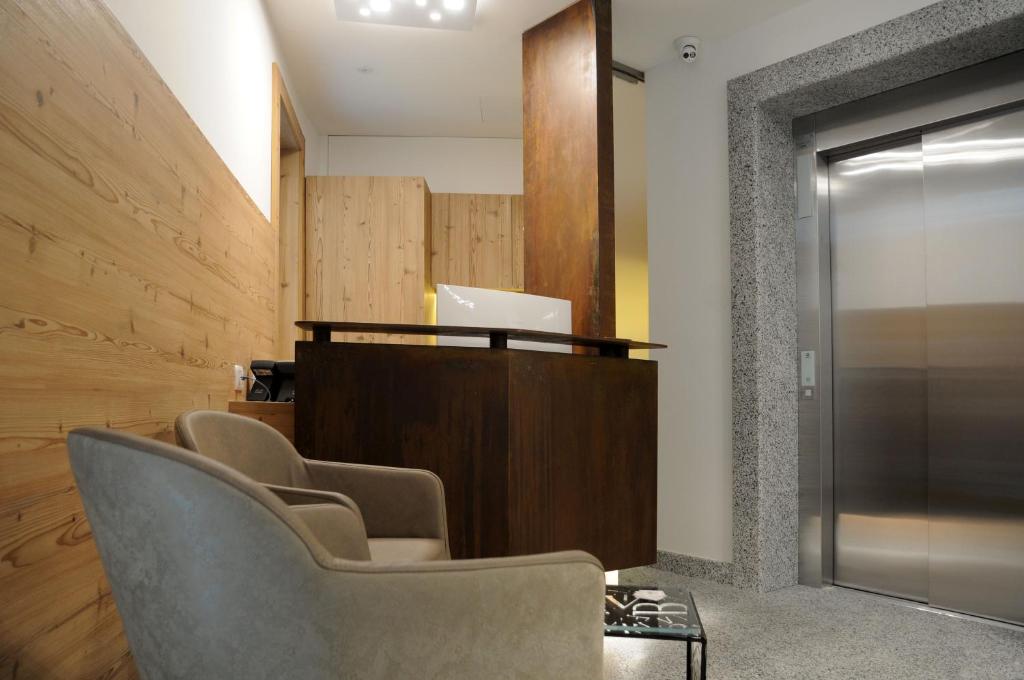 A seating area at TOURING HOTEL & SPA