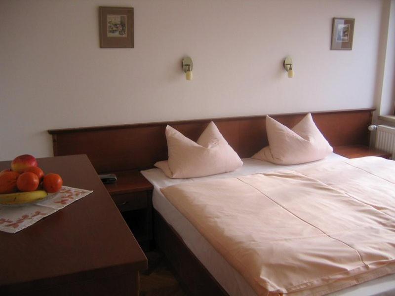 Postel nebo postele na pokoji v ubytování Pension Apartment Granit