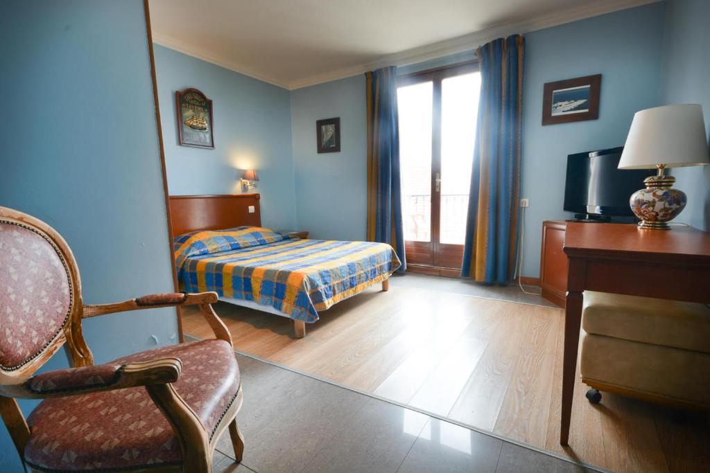 Postel nebo postele na pokoji v ubytování Baccarat Hostel