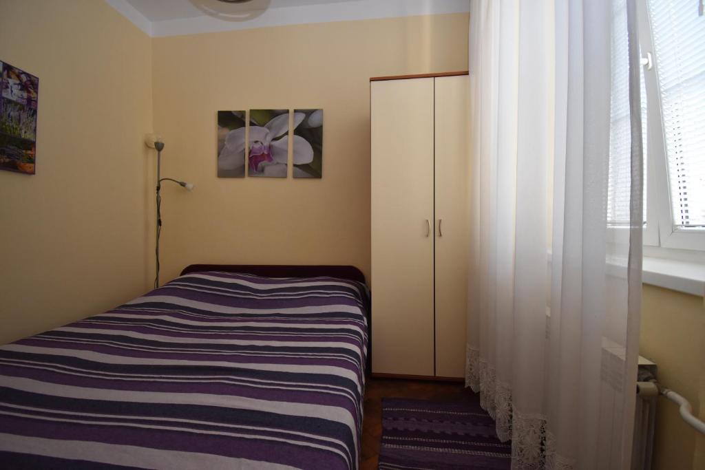 Postel nebo postele na pokoji v ubytování Apartment Morena