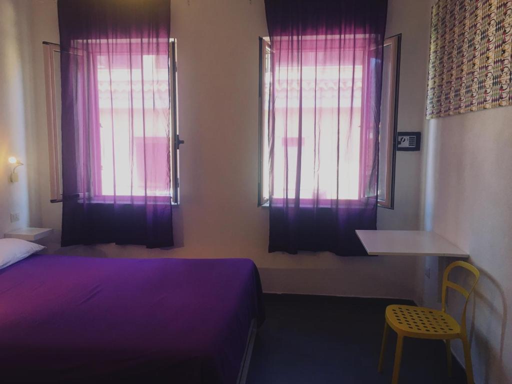 Letto o letti in una camera di Accomodation Libertino