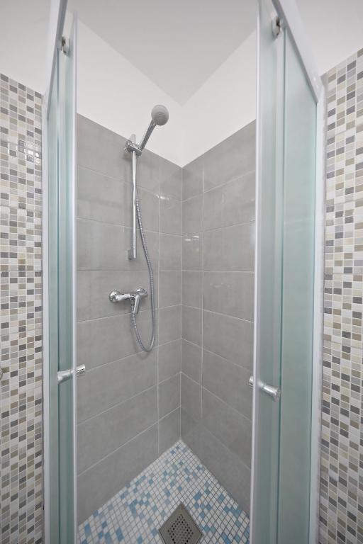 Kúpeľňa v ubytovaní Apartmani NEVA, Pridraga