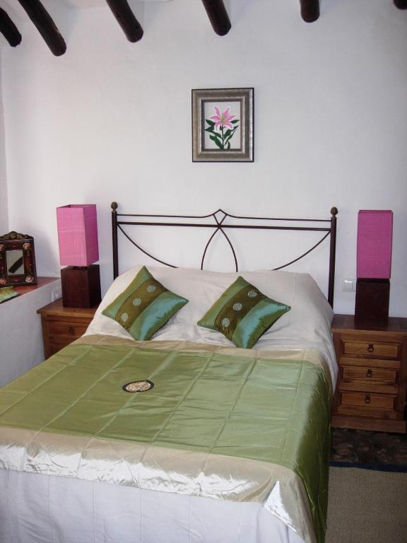 Postel nebo postele na pokoji v ubytování Lirio Azul Casa Rural
