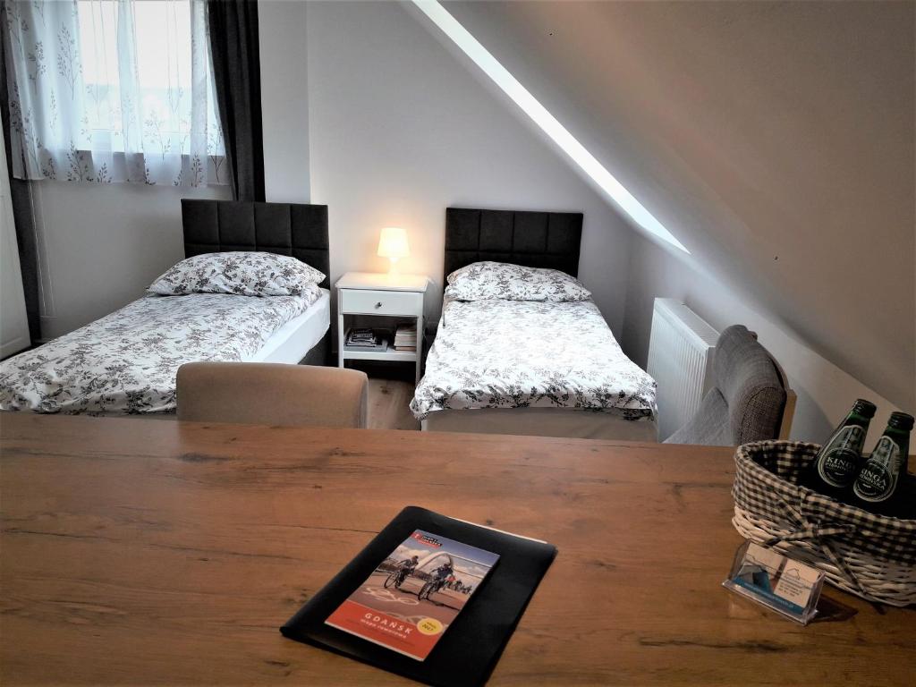 Posteľ alebo postele v izbe v ubytovaní Pietrzak Apartments