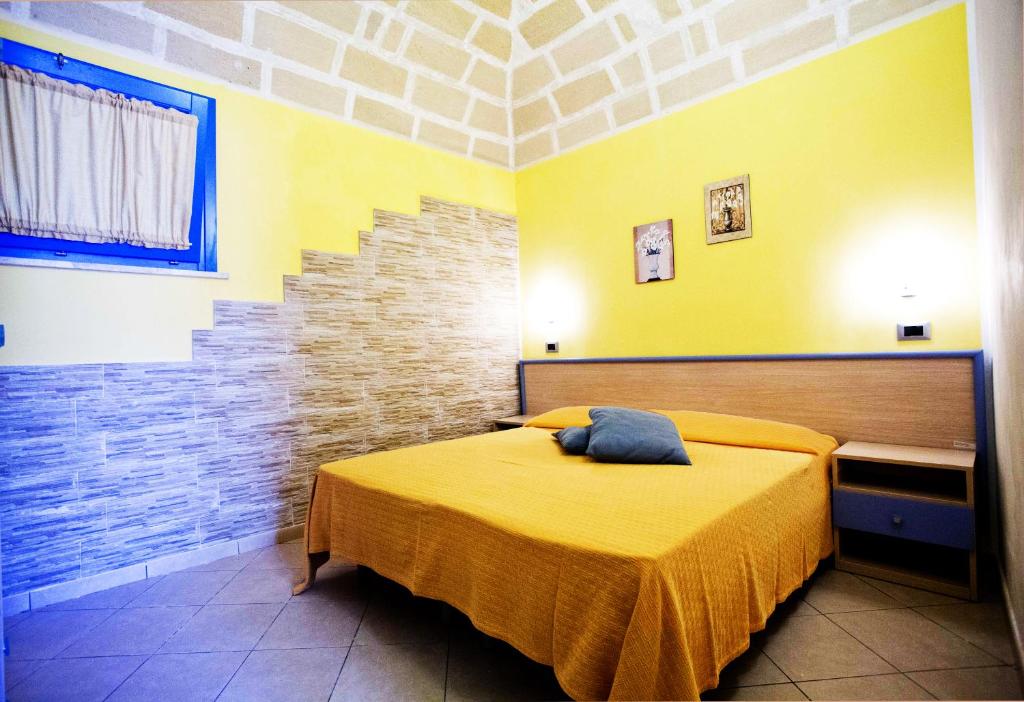 Postel nebo postele na pokoji v ubytování Terra del Sole