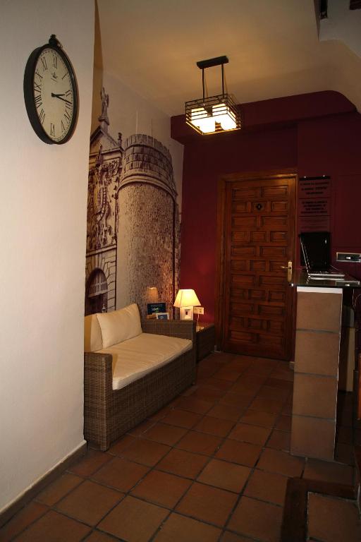 Posteľ alebo postele v izbe v ubytovaní Hostal la posada de Zocodover