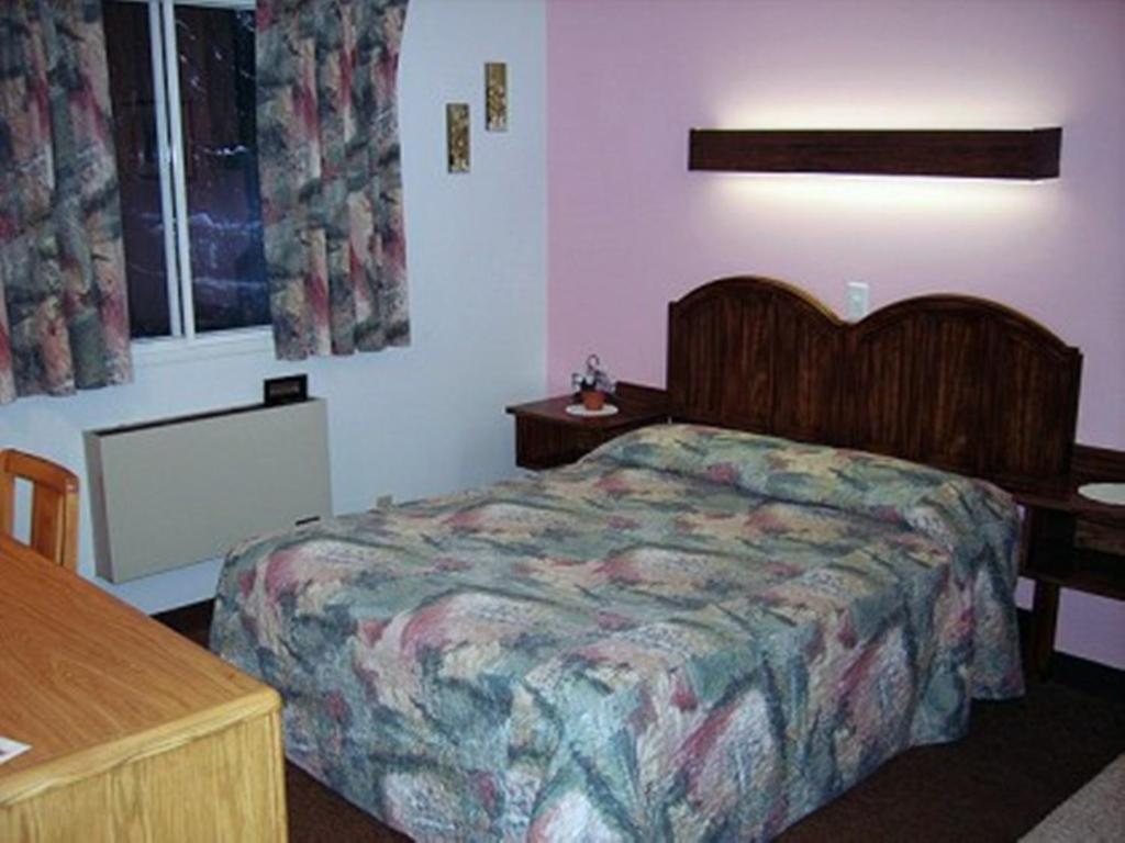 Letto o letti in una camera di Auberge Mountain View Inn