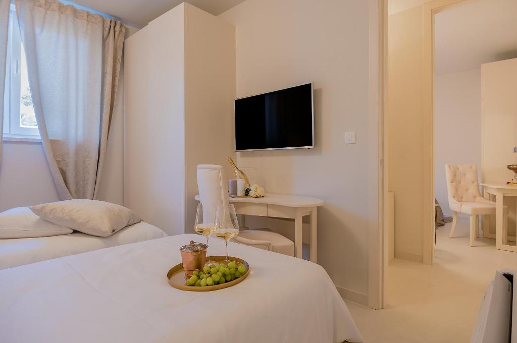 Postel nebo postele na pokoji v ubytování LevelUp Apartment Split