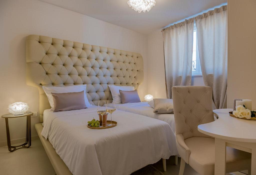 Postel nebo postele na pokoji v ubytování LevelUp Apartment Split