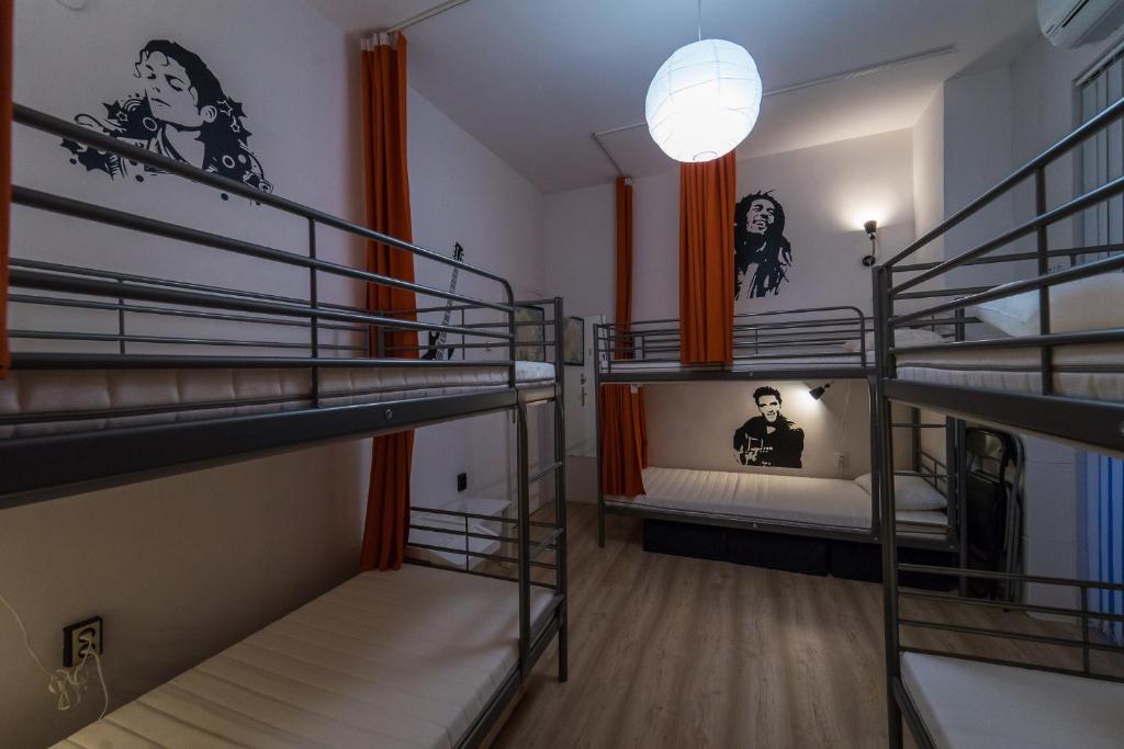 Postel nebo postele na pokoji v ubytování Pijama Hostel