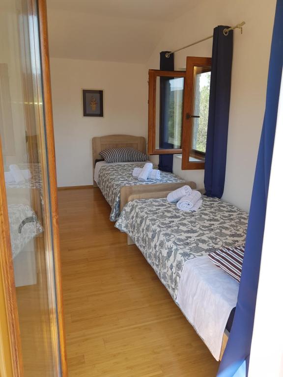 Postel nebo postele na pokoji v ubytování Holiday Home Strpuncina