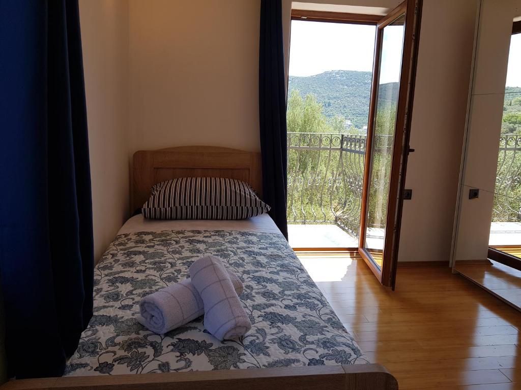 Postel nebo postele na pokoji v ubytování Holiday Home Strpuncina