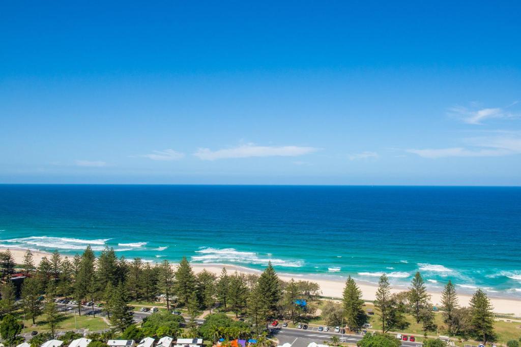 an aerial view of the beach and the ocean at Oscar On Main Beach Resort in Gold Coast