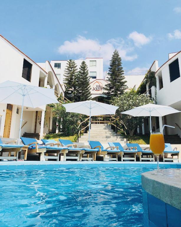 Bazén v ubytování Hotel Villa Jazmin nebo v jeho okolí