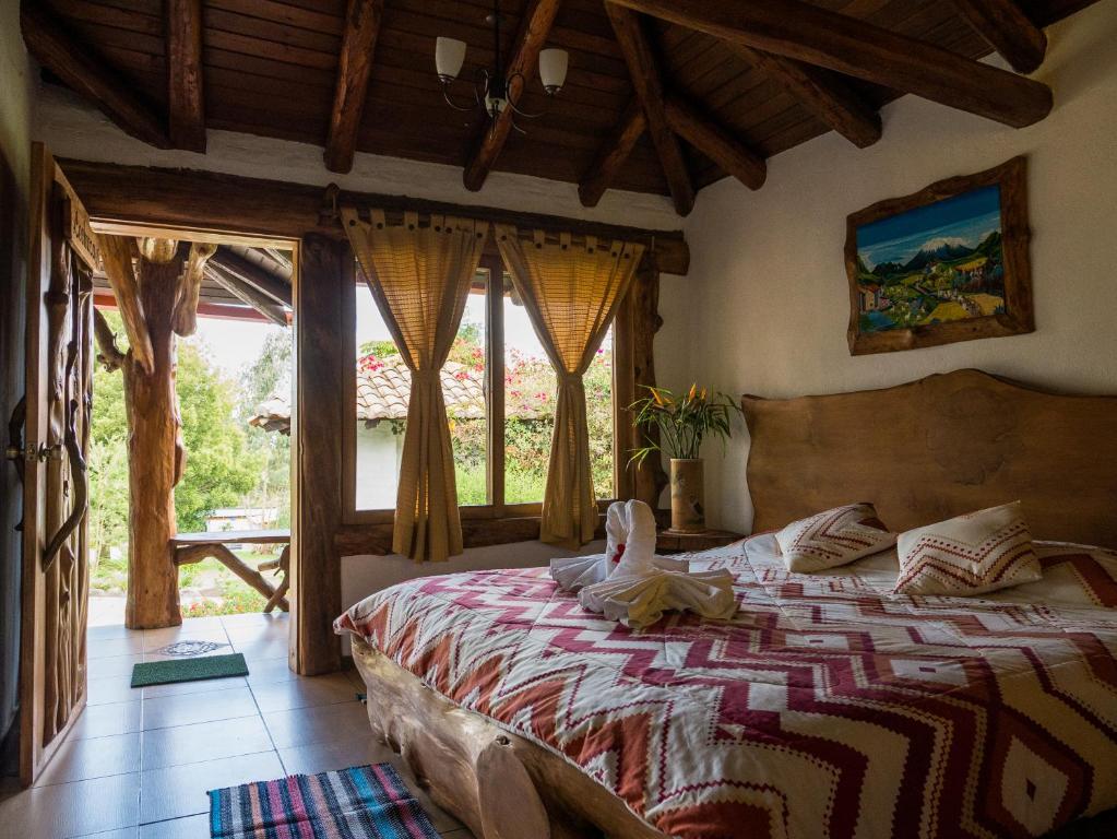 Postel nebo postele na pokoji v ubytování Zaysant Ecolodge