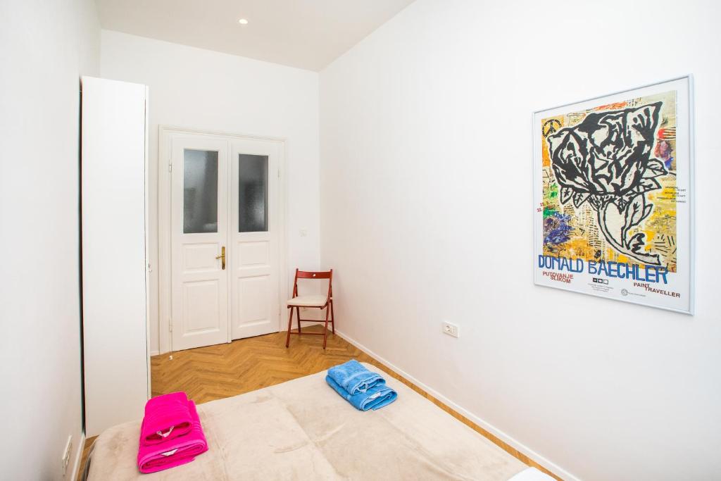 Postel nebo postele na pokoji v ubytování Apartment Mary