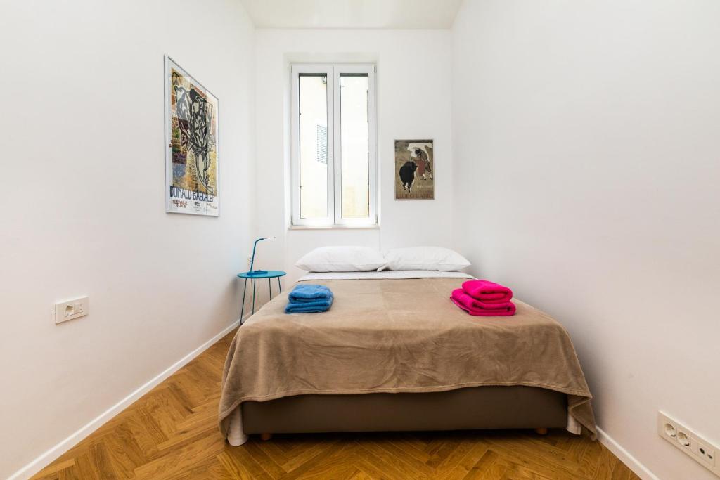 Postel nebo postele na pokoji v ubytování Apartment Mary