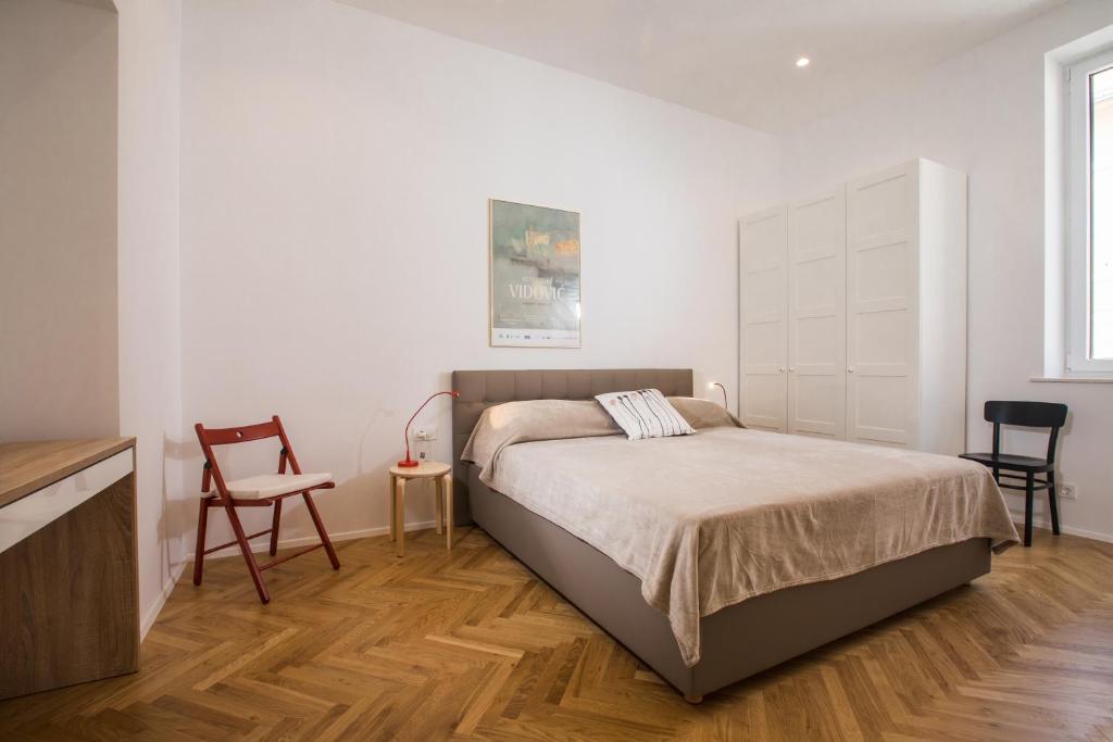 Postel nebo postele na pokoji v ubytování Apartment Mary