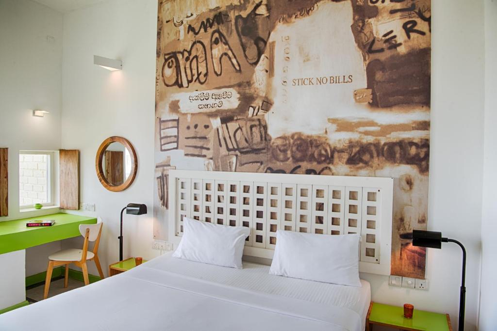 Postel nebo postele na pokoji v ubytování Hotel J Negombo