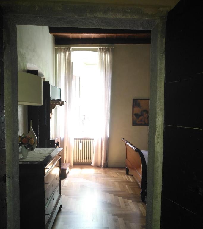 Letto o letti in una camera di B&B Dimora Delle Donnole Bergamo Alta
