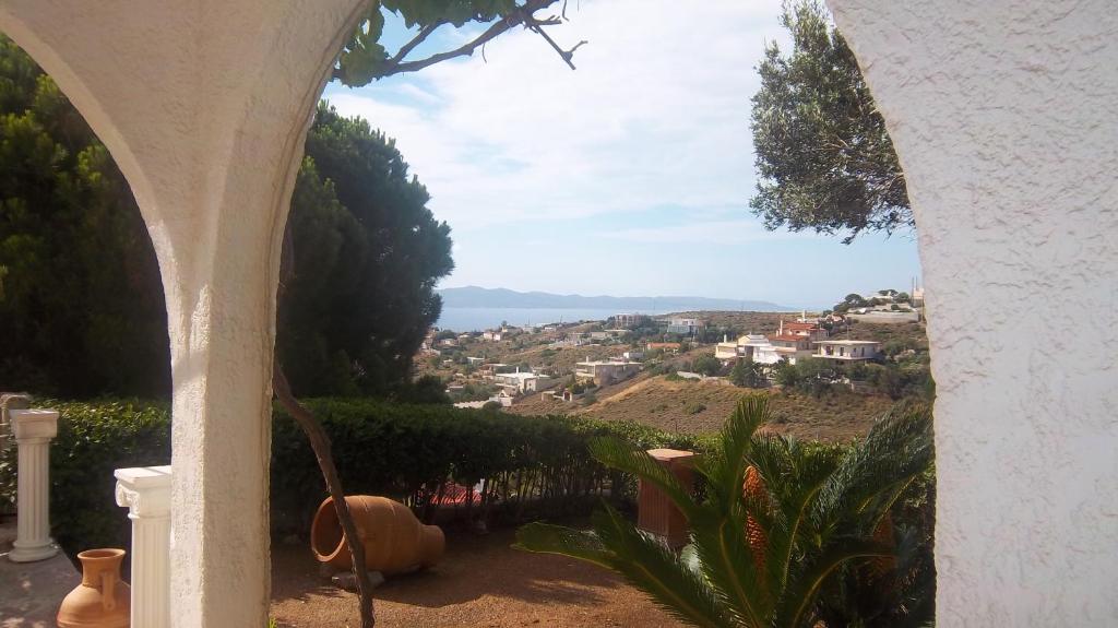 a view of a town from a house balcony at Beautiful Island house with sea view in Spiliazéza