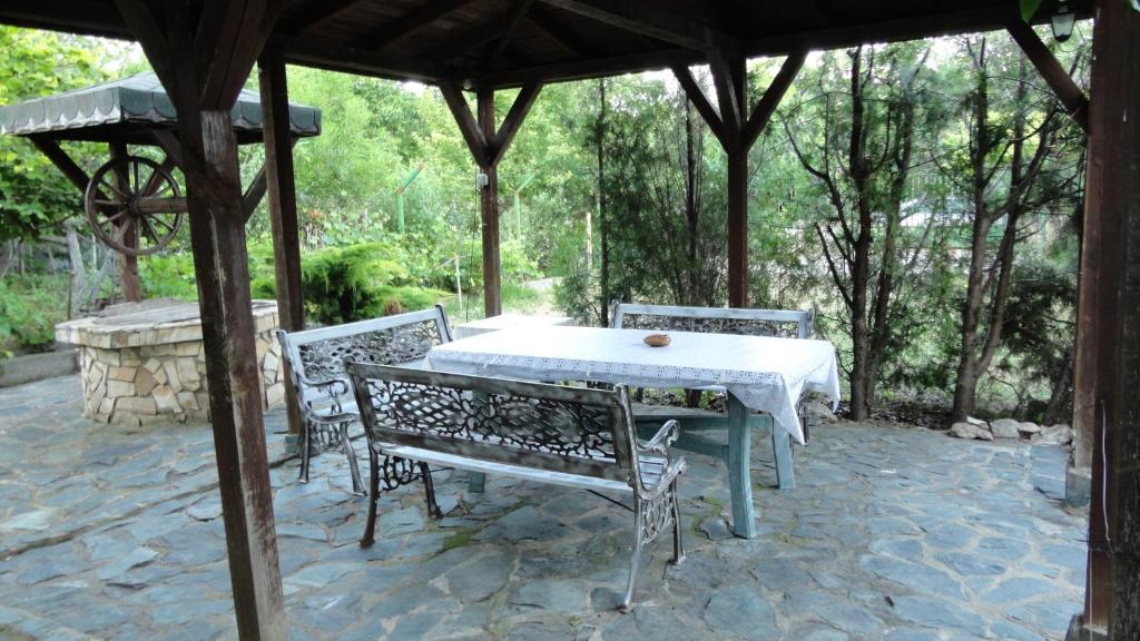 a table and chairs under a gazebo at Villa Sunny Day in St. St. Constantine and Helena
