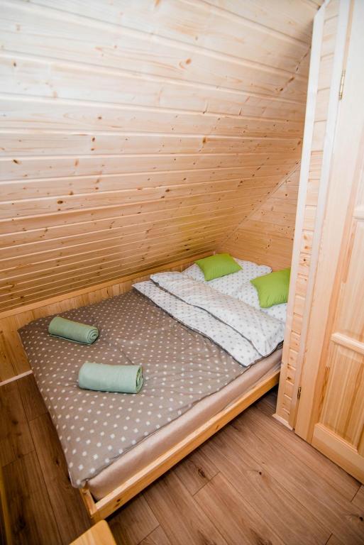 Postel nebo postele na pokoji v ubytování Ustecka Osada - Ustka (Przewłoka)