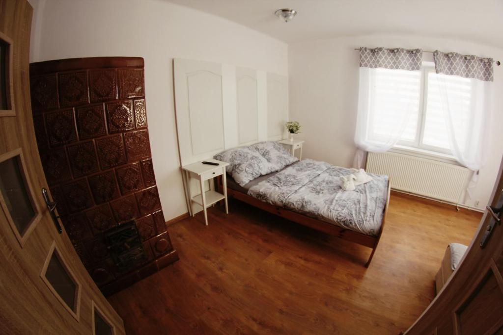 Postel nebo postele na pokoji v ubytování Folwark Anna
