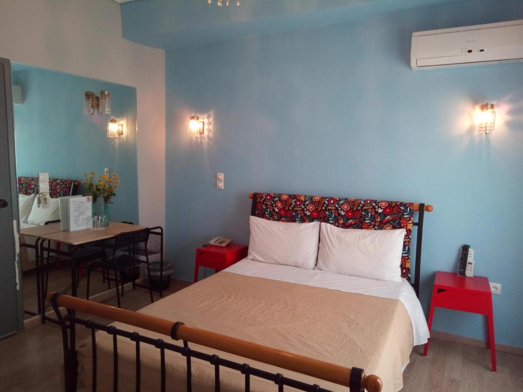 Posteľ alebo postele v izbe v ubytovaní Zappion Hotel