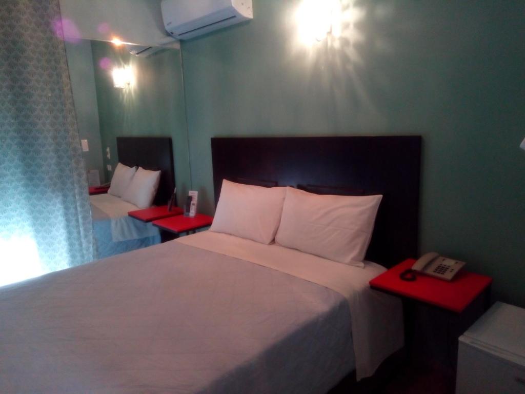 Posteľ alebo postele v izbe v ubytovaní Zappion Hotel