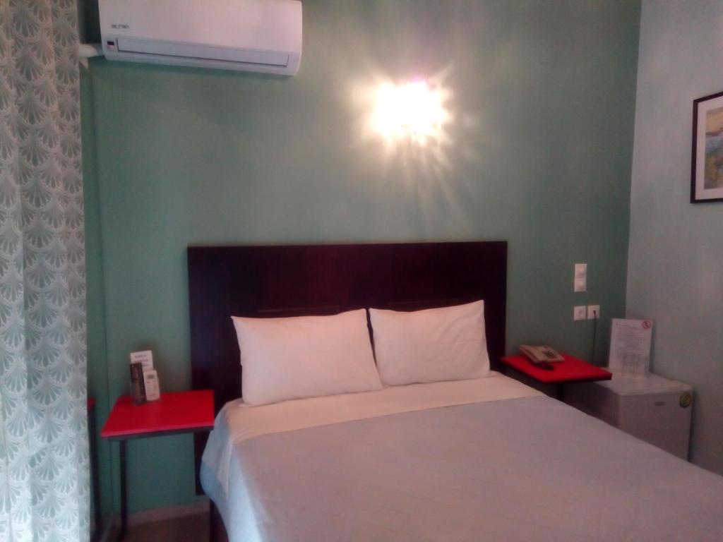 Posteľ alebo postele v izbe v ubytovaní Zappion Hotel