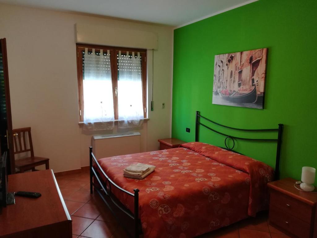 Posteľ alebo postele v izbe v ubytovaní B&B Ciampino