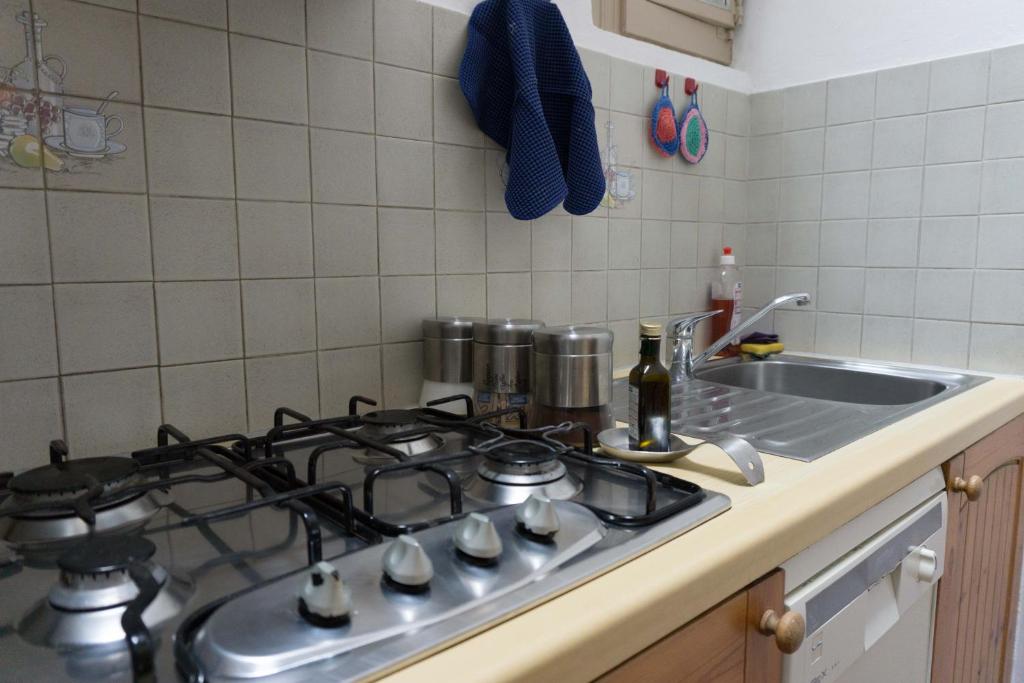 Kuchyňa alebo kuchynka v ubytovaní Olona Place 3