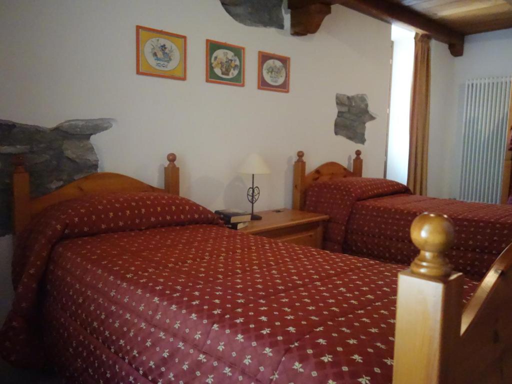 Postel nebo postele na pokoji v ubytování Auberge Lou Créton di Lui Hostel