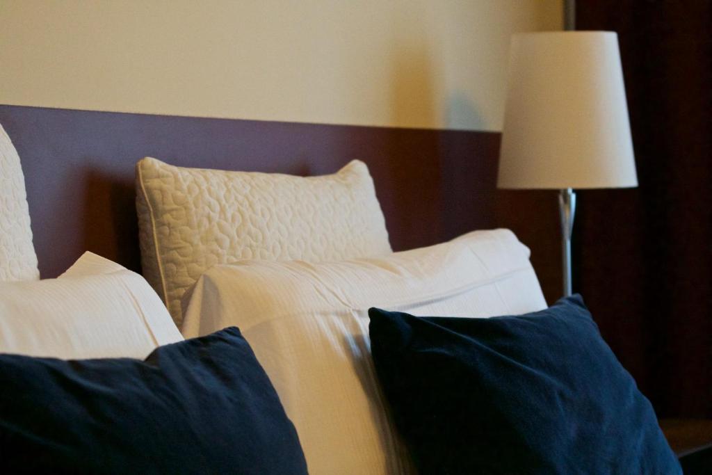 Postel nebo postele na pokoji v ubytování Hotel Clocchiatti Next