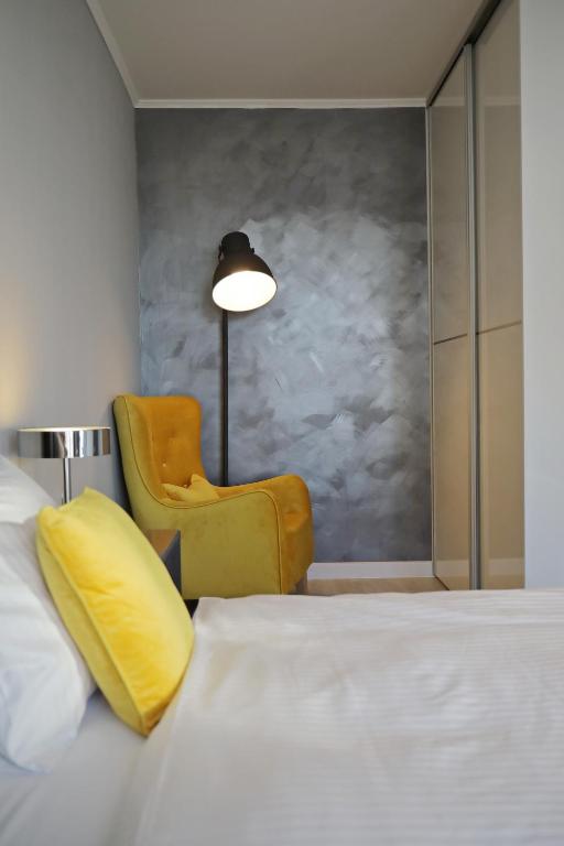 Posteľ alebo postele v izbe v ubytovaní City Marine Luxury Apartments
