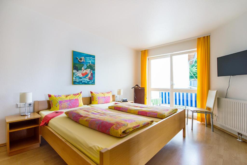 Postel nebo postele na pokoji v ubytování Apart Hotel Stadtgarten