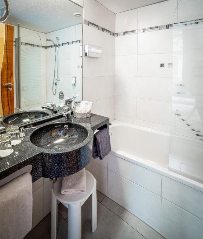 Koupelna v ubytování Hotel Spitzberg Garni