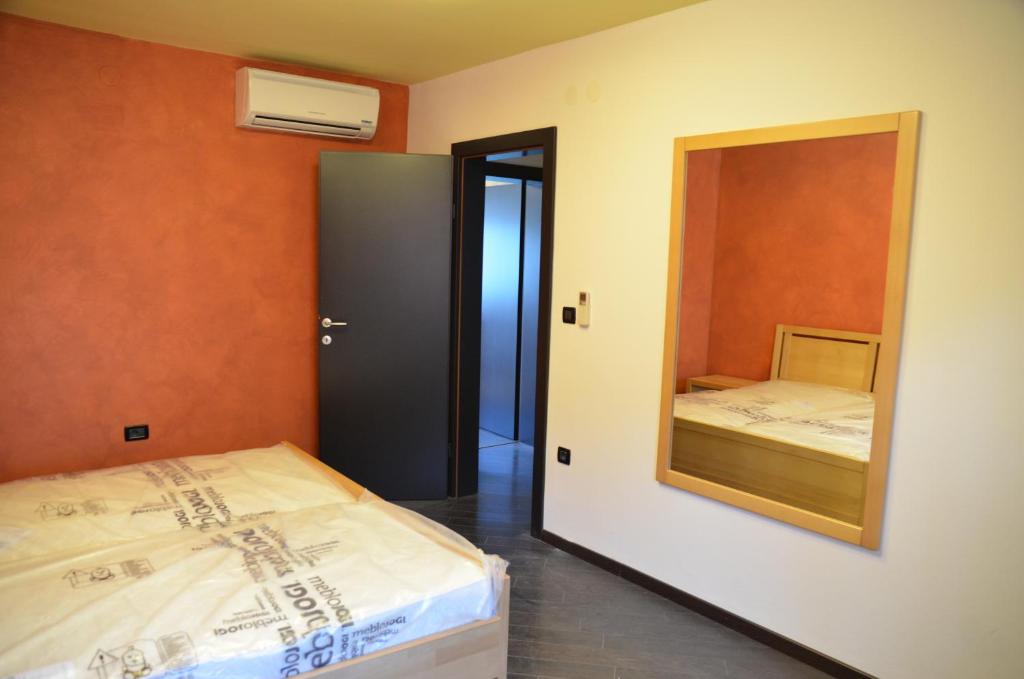 Łóżko lub łóżka w pokoju w obiekcie Apartments Ana City