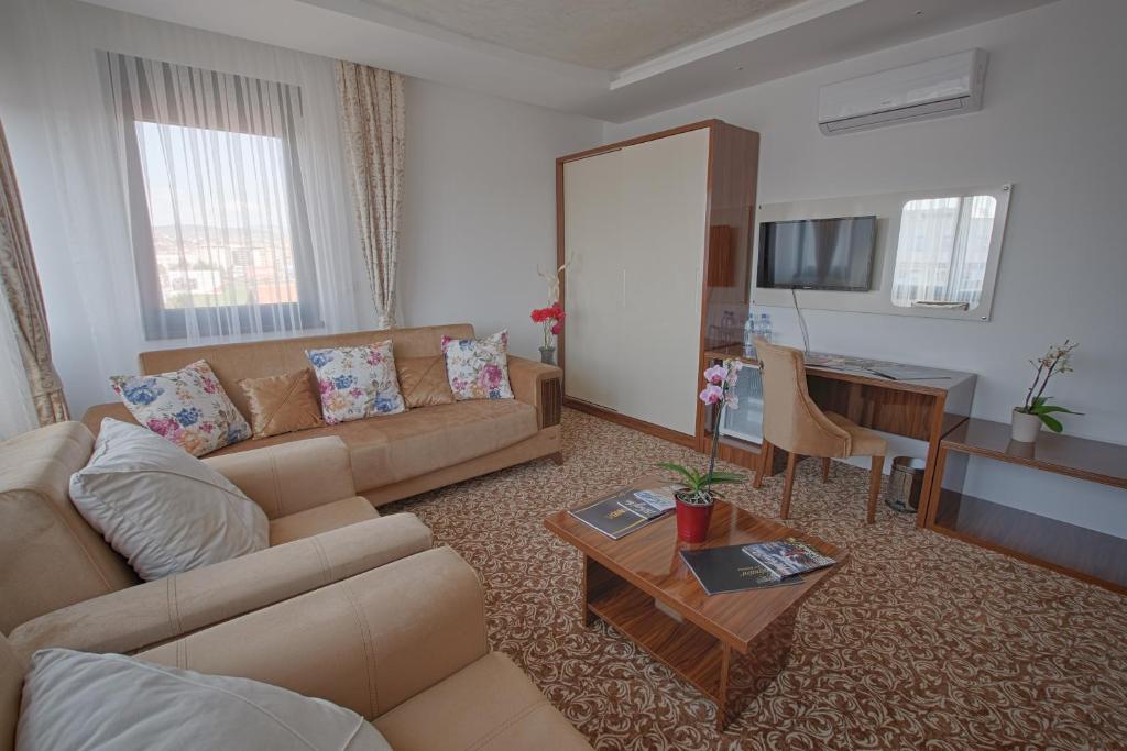 TV a/nebo společenská místnost v ubytování New Hotel
