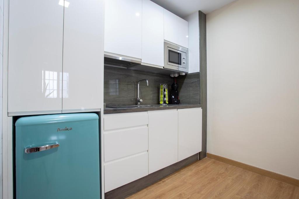 Kuchnia lub aneks kuchenny w obiekcie Flamingo Apartment
