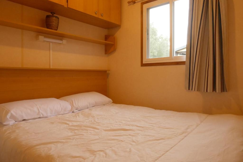 Cama o camas de una habitación en Camping Port Massaluca