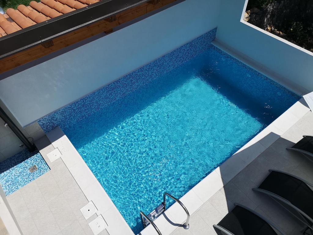 Bazén v ubytování Apartment Miric nebo v jeho okolí