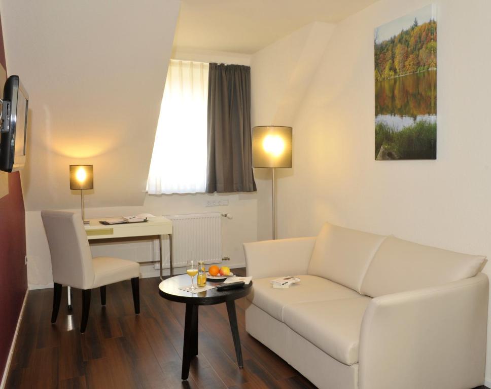 Posezení v ubytování Hotel Goldener Knopf