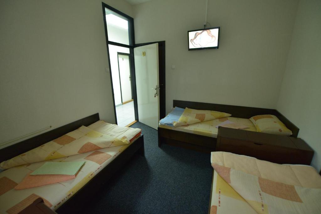 Postel nebo postele na pokoji v ubytování Guesthouse Duga