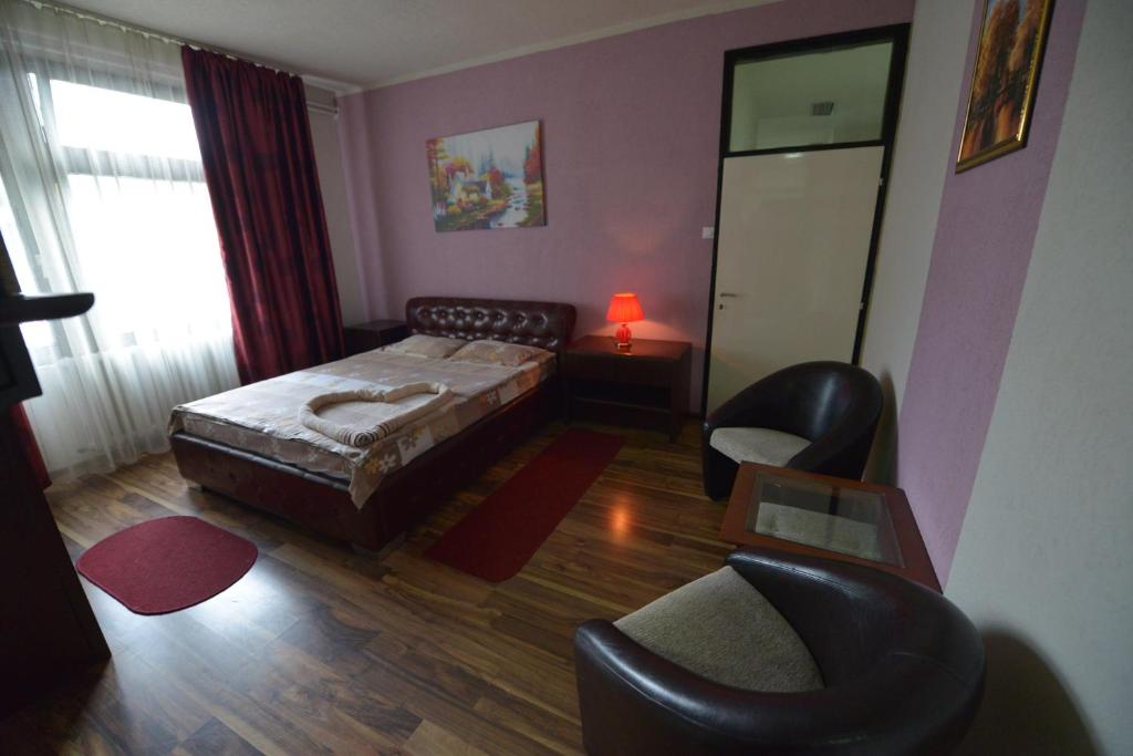 Postel nebo postele na pokoji v ubytování Guesthouse Duga