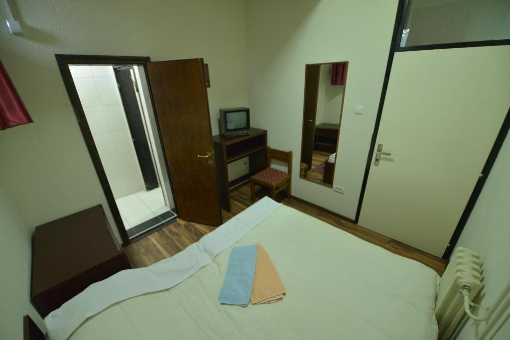 Postel nebo postele na pokoji v ubytování Guesthouse Duga
