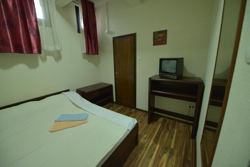 Postel nebo postele na pokoji v ubytování Guesthouse Duga