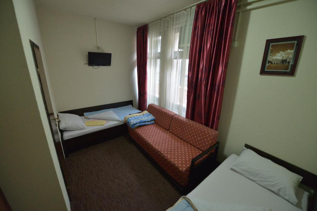 Postel nebo postele na pokoji v ubytování Guesthouse Duga
